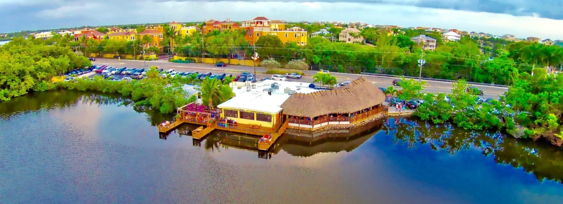A boat dock with several boats docked in it.
