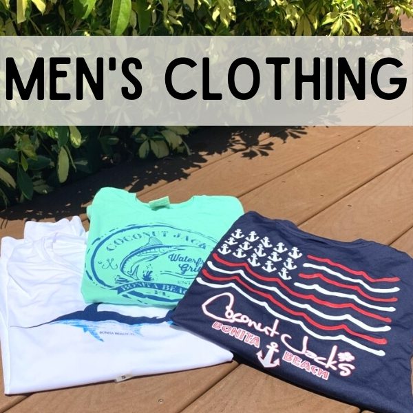 A bunch of t shirts that are on the ground