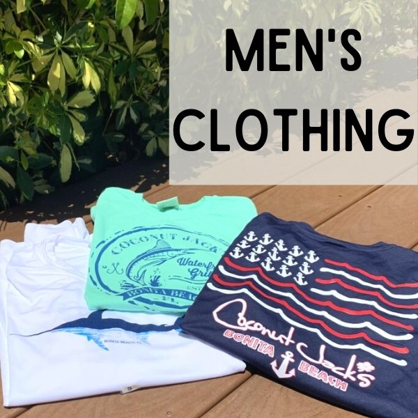 A group of men 's clothing on top of a wooden deck.