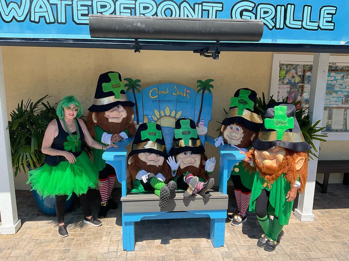 A group of people dressed up as leprechauns.