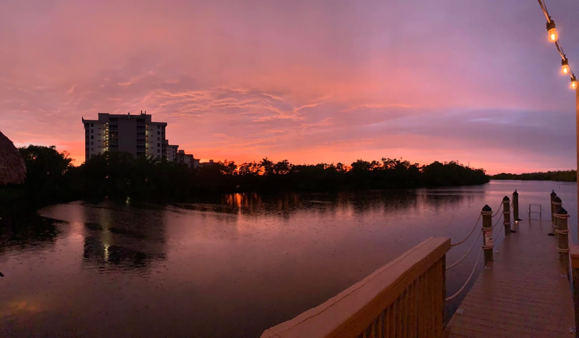 A view of the sunset from across the water.