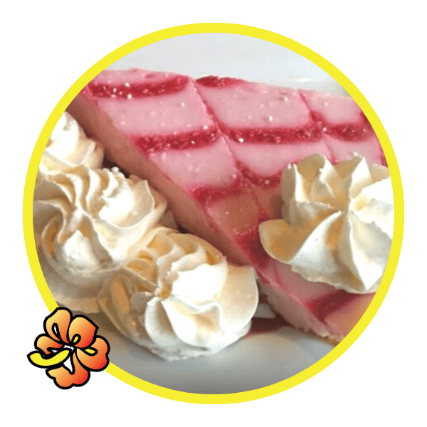 A close up of some whipped cream on top of cake