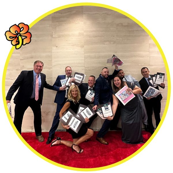 A group of people holding up laptops in front of their faces.