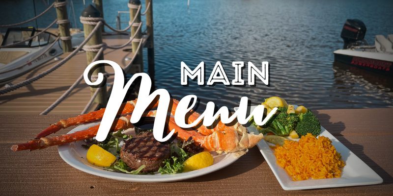 A plate of food on the table with the words " main menu ".