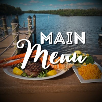 A plate of food on the dock with a view of water.
