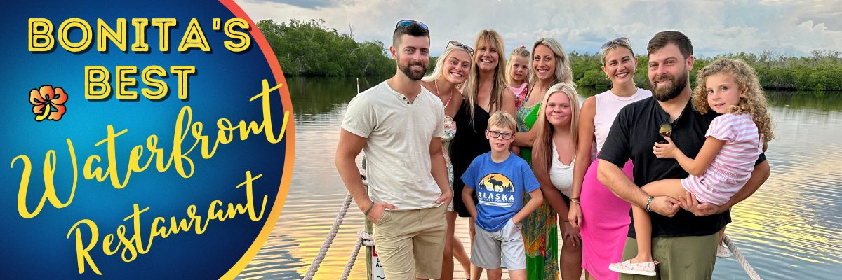 A group of people standing on the dock