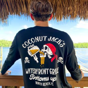 A man wearing a pirate shirt and holding a beer.